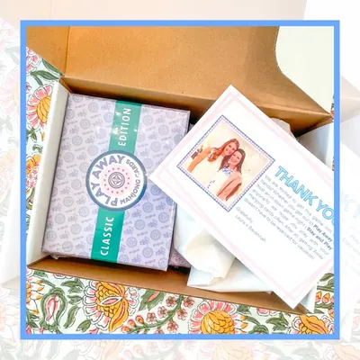 Classic Edition in a kraft gift box with a thank-you card