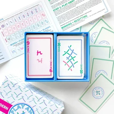Modern Edition open tray showing a 9 Crack and an 8 Bam card in fresh line art