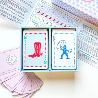 Texas Edition open tray showing a cowboy boot 8 Crack and a lasso Joker card