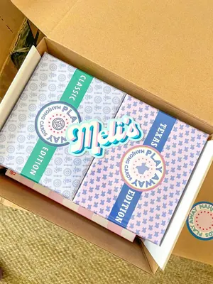 Classic and Texas Edition boxes packed side by side in a kraft shipping box